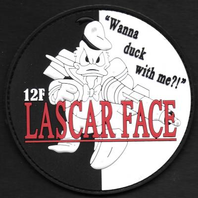 12 F - Lascar face
